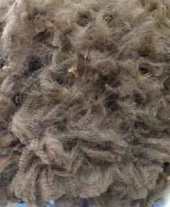 A close up of the fur on a sheep