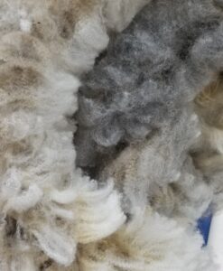 A close up of some wool in the air