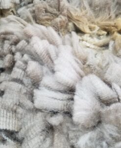 A pile of white fur is shown in this image.