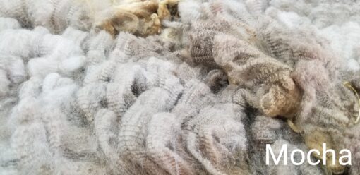 A pile of white and brown yarn.