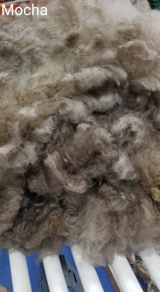 A close up of some wool in the air